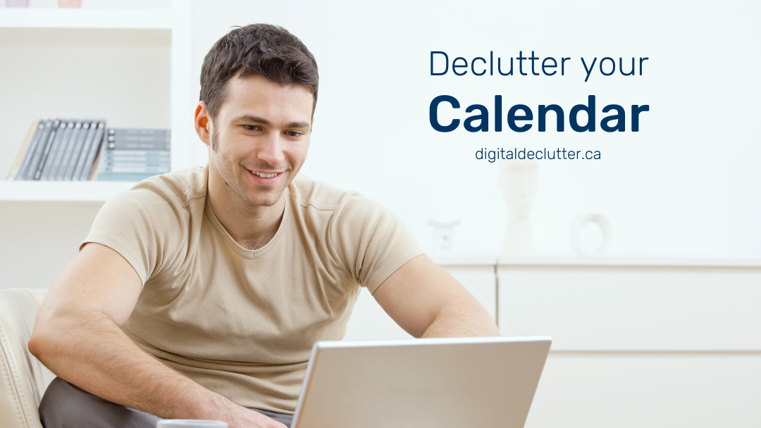 Man in a brown t-shirt sitting in front of his laptop in a brightly list room happy because his calendar is organized