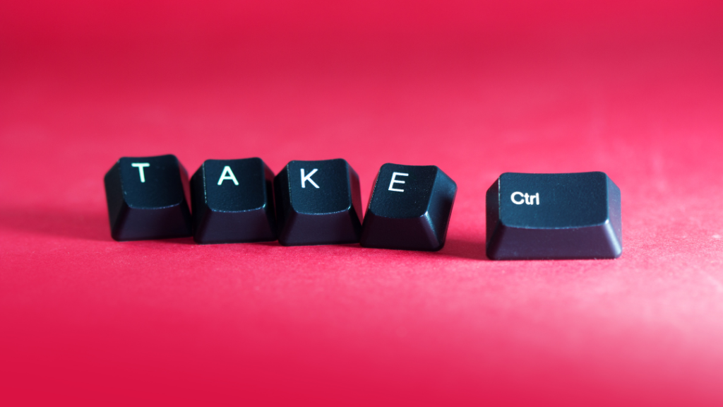 Keys removed from a computer keyboard that spell out "TAKE Ctrl"