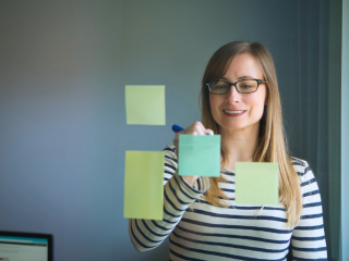 Illustration of executive assistant joyfully working on client tasks
